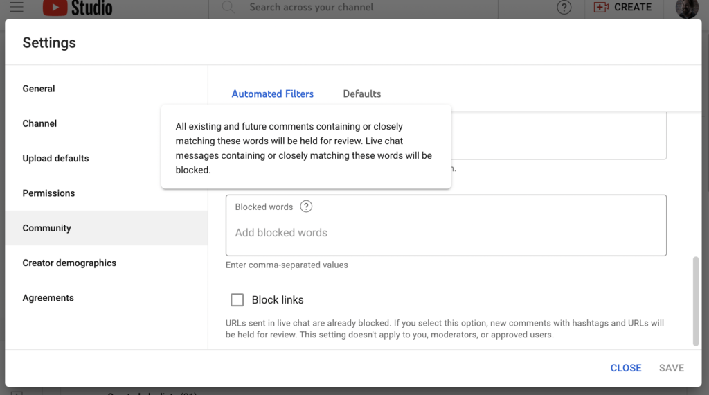 From settings, choose "Community" and look for the "Blocked words" option.
